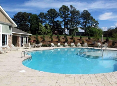 swimming pool with submerged sunbathing deck